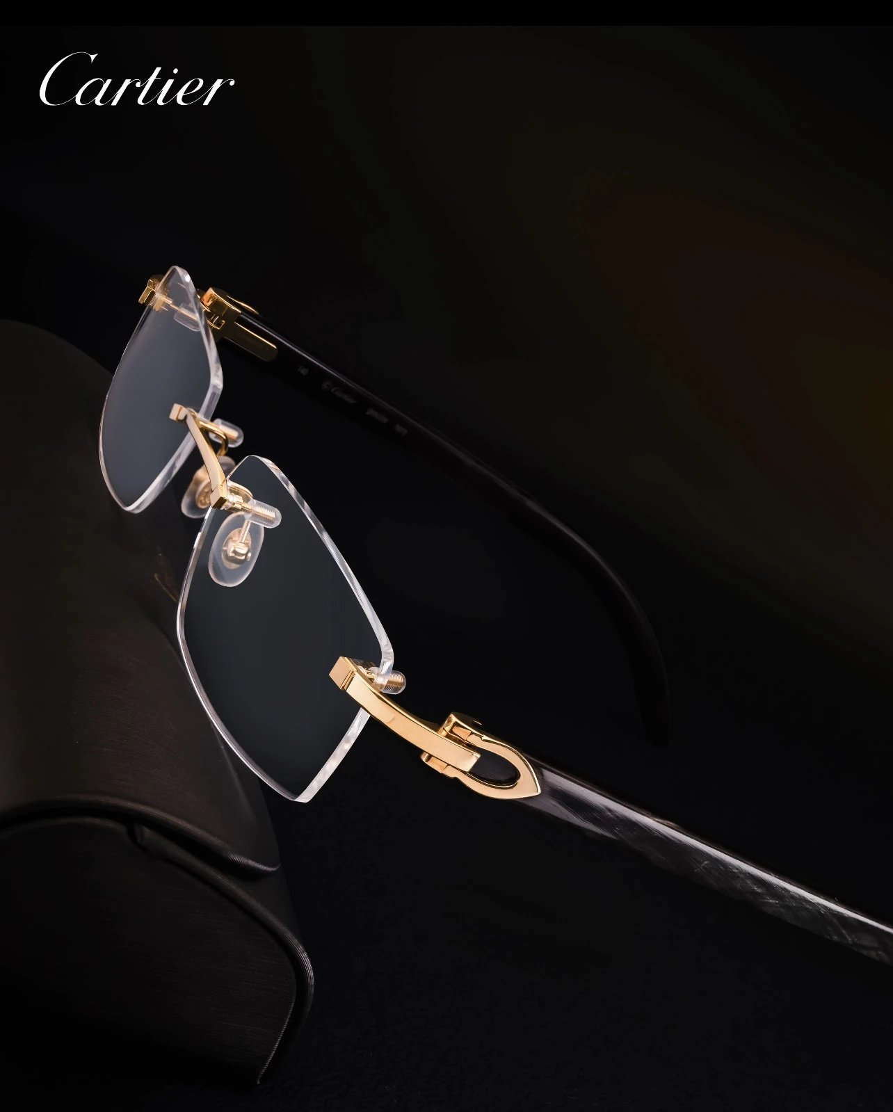 City Specs 2026 Profile view of Cartier CT0049O 001 gold rimless spectacles on display at City Specs Manchester and Sheffield