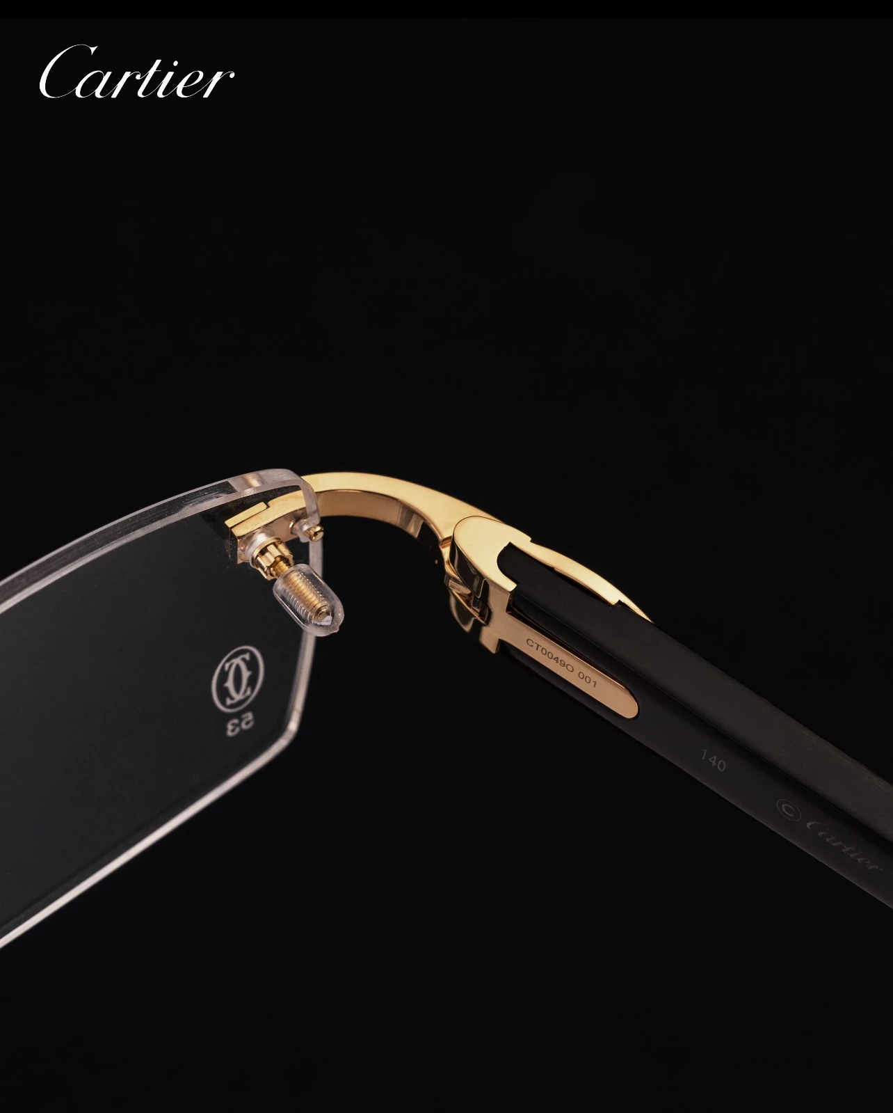 City Specs 2026 Profile view of Cartier CT0049O 001 gold rimless spectacles on display at City Specs Manchester and Sheffield