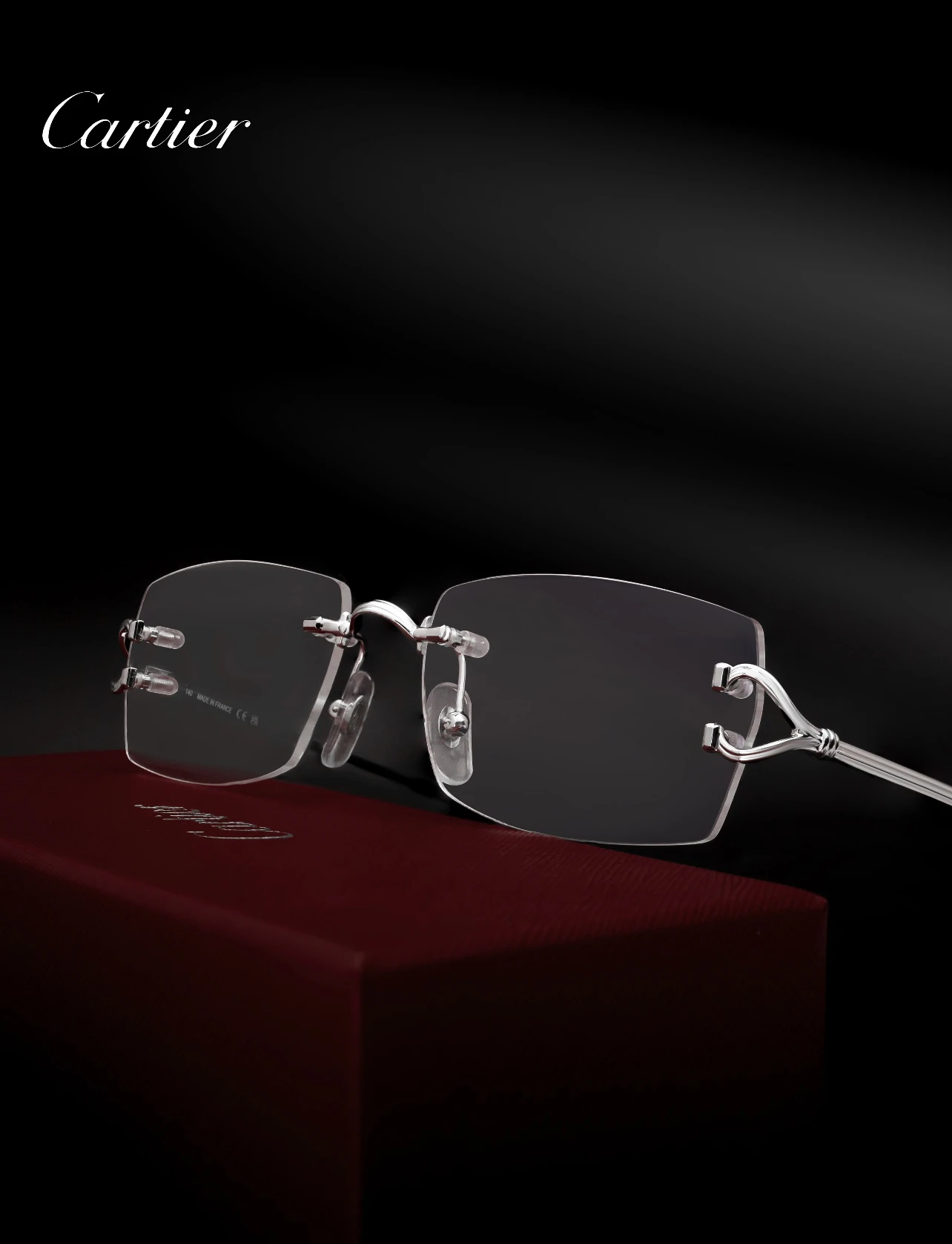 City Specs 2026 Silver open-worked hinge detail on Cartier CT0563O 002 rimless frames at City Specs