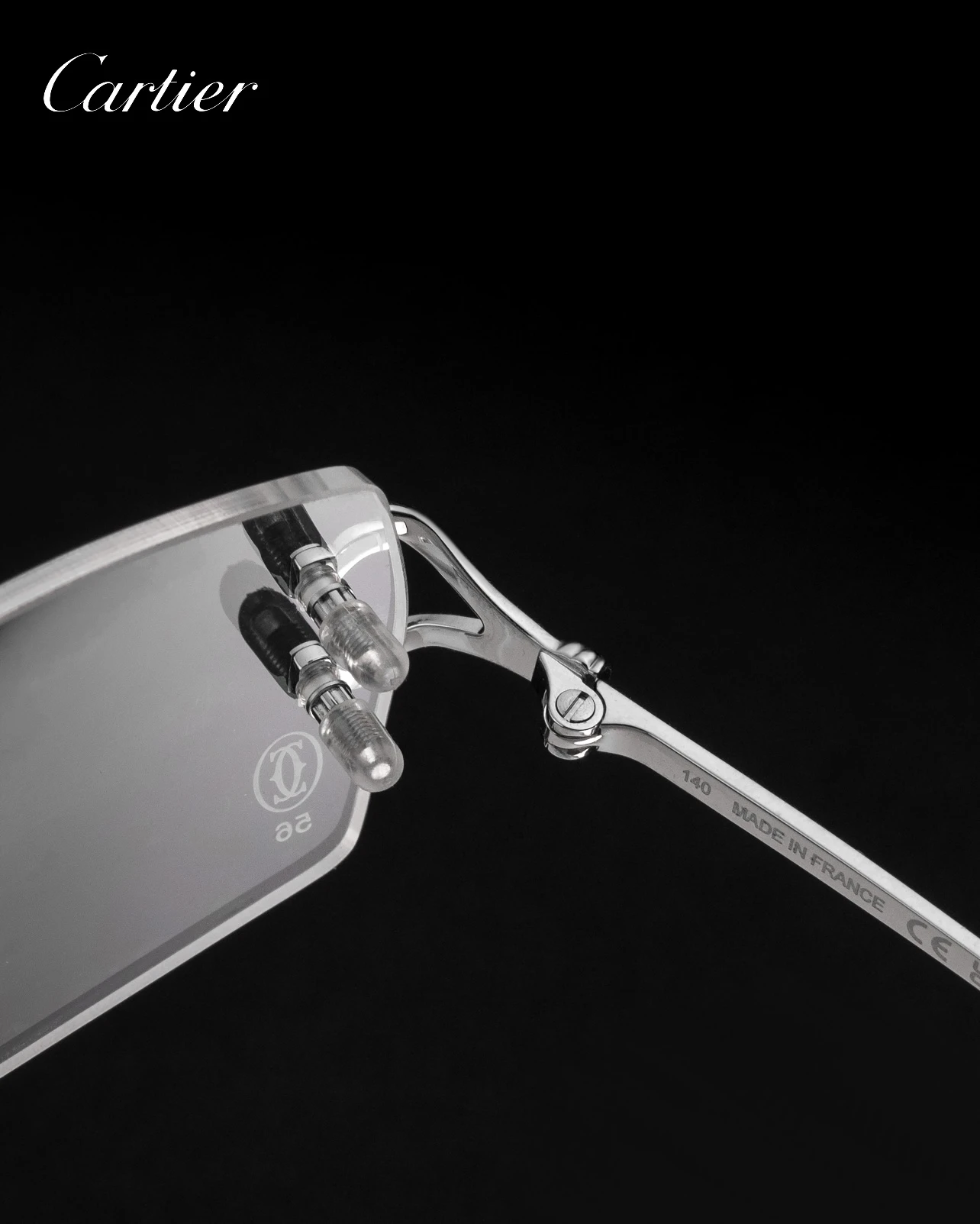 City Specs 2026 Silver open-worked hinge detail on Cartier CT0563O 002 rimless frames at City Specs