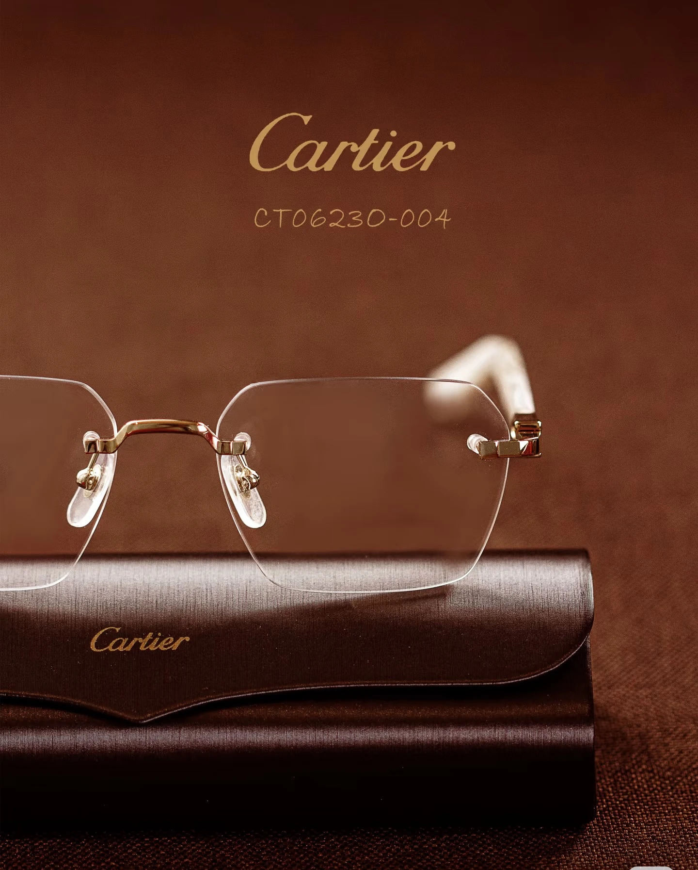 City Specs 2026 View of Cartier CT0623O 004 gold and white rimless glasses on brown case at City Specs opticians
