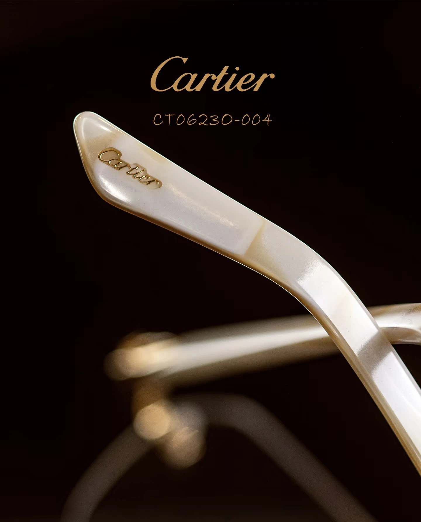 City Specs 2026 View of Cartier CT0623O 004 gold and white rimless glasses on brown case at City Specs opticians